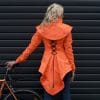 Neon orange expandable rain jacket for cycling and horse riding